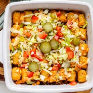 Big Mac tater tot casserole in a white baking dish.