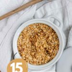 A nut and seed mix in a bowl with the text 15 toppings to finish any dish.