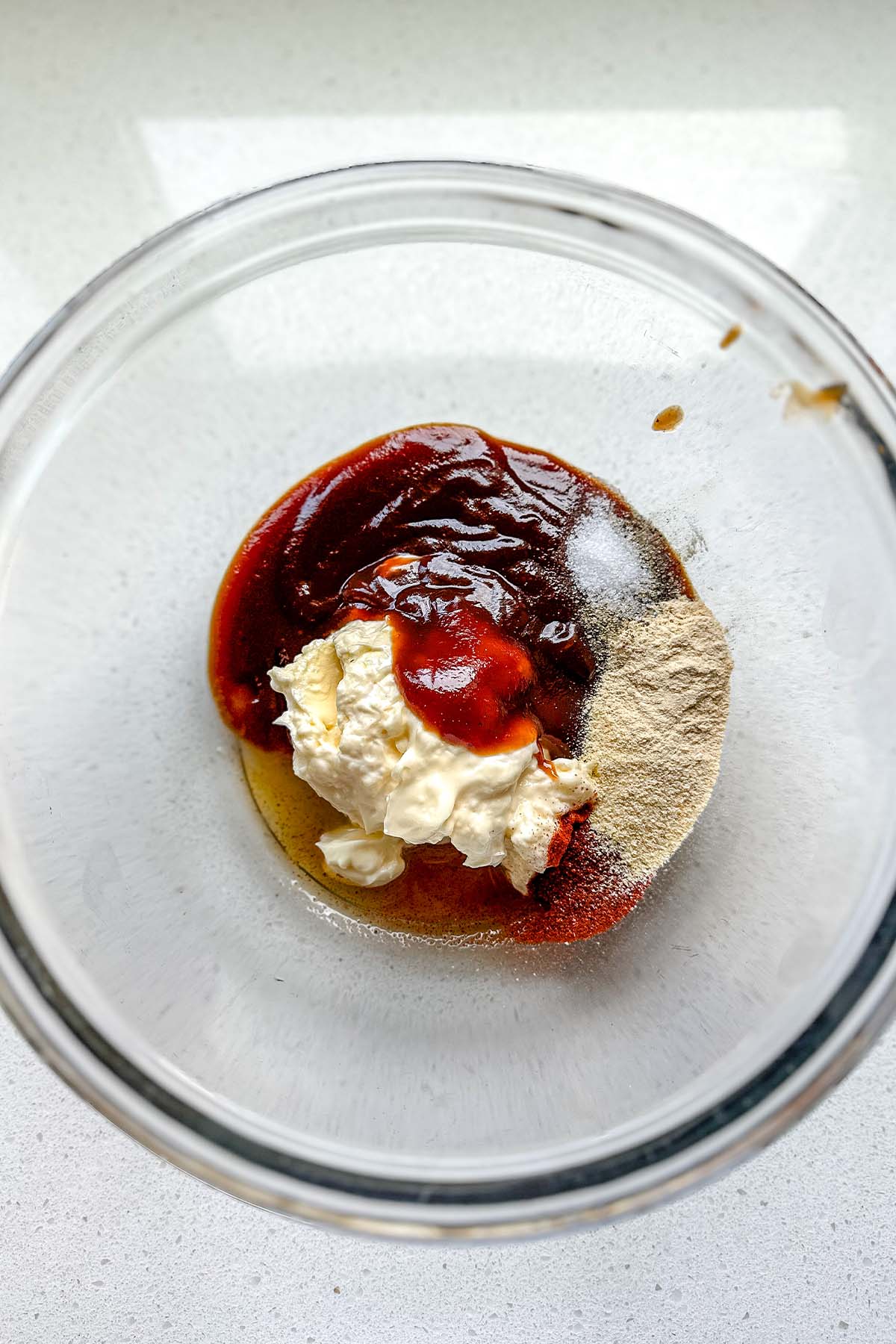 Ingredients for bbq mayo in a bowl.