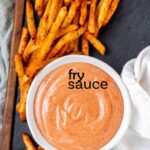 Orange sauce in a bowl with the text fry sauce.