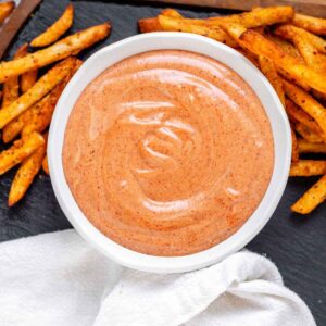 Orange sauce in a bowl.